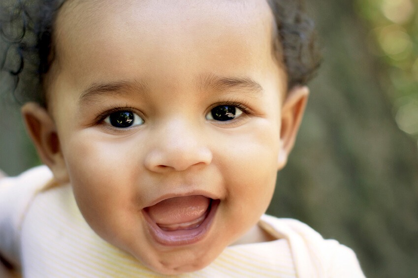 smiling child shows oral health